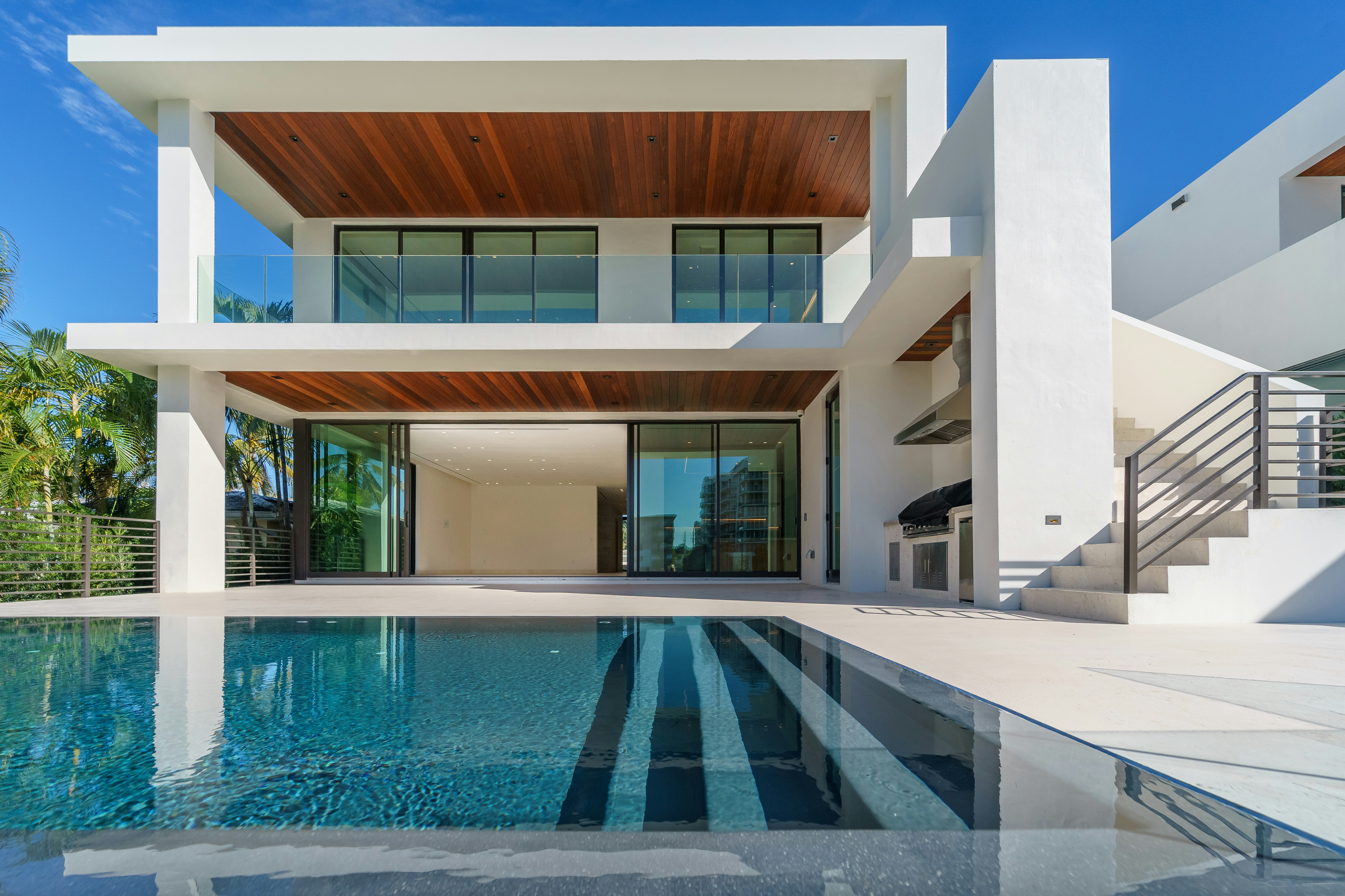 Modern palace villa at dusk - Palace Properties